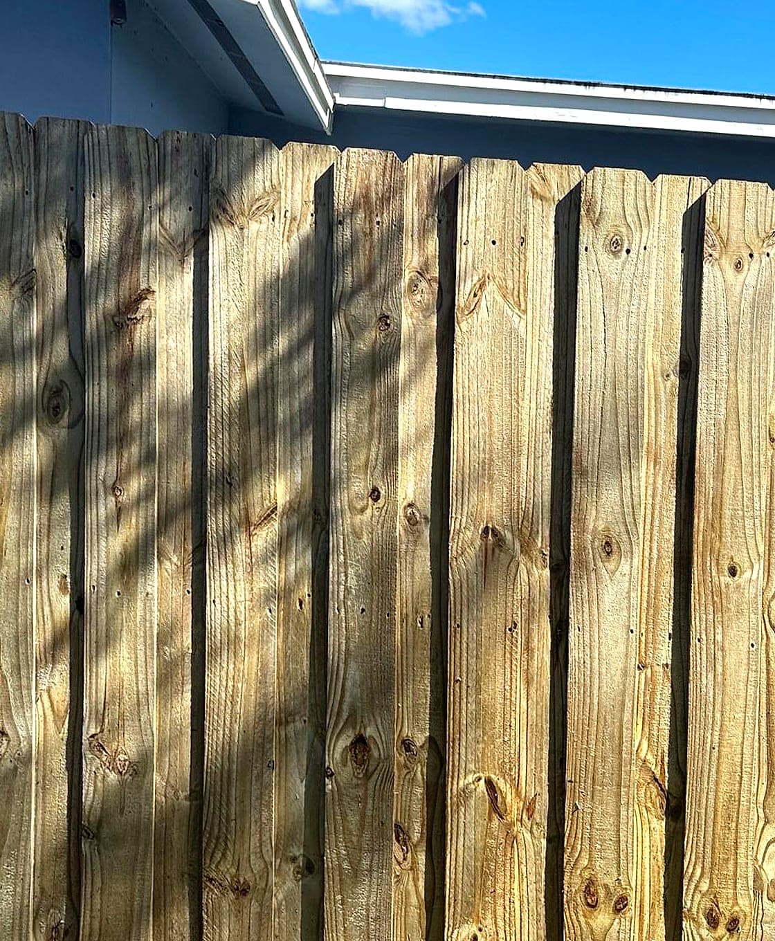 Wood fence, brought back, pressure washing by Off The Muscle in Palm Beach County