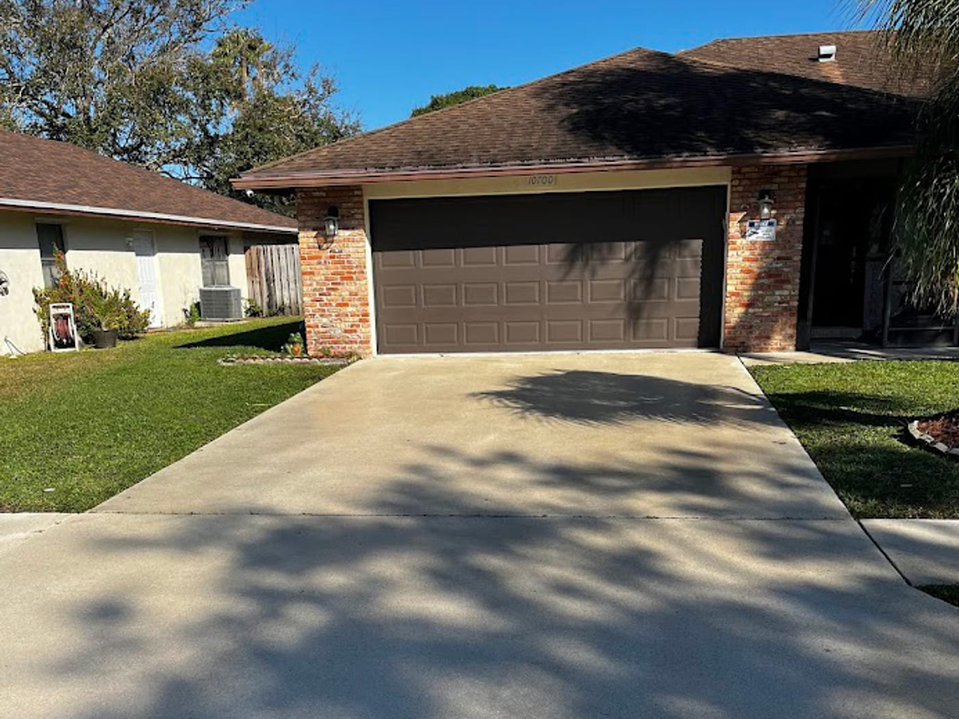 The same driveway restored to an even, like-new finish