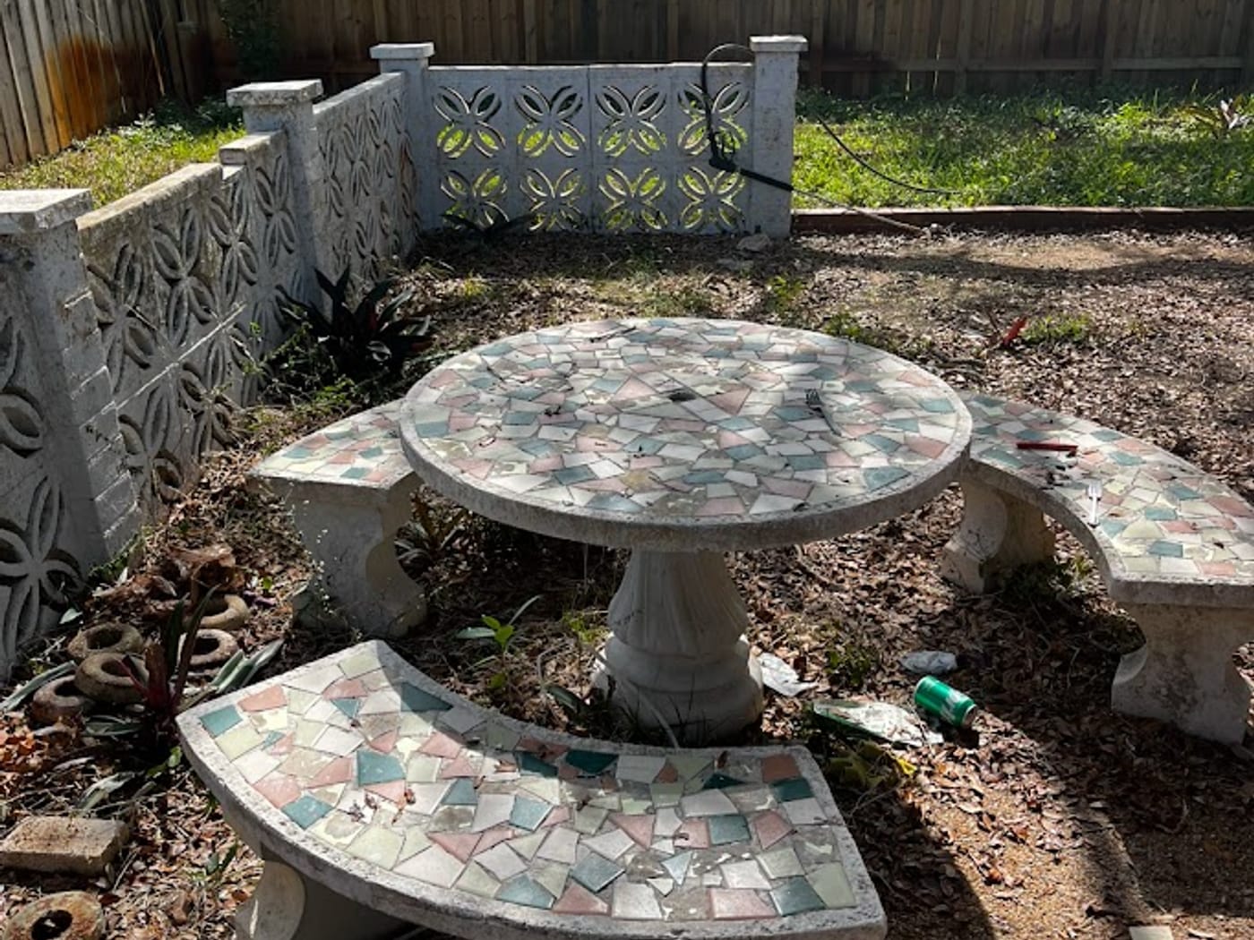 Grimy, mildew-stained back patio before cleaning